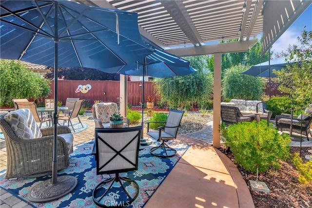 view of patio featuring a pergola, outdoor dining area, outdoor lounge area, and fence