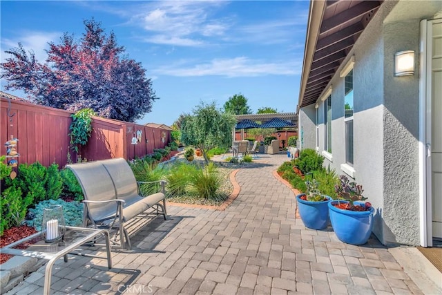 view of patio with a fenced backyard