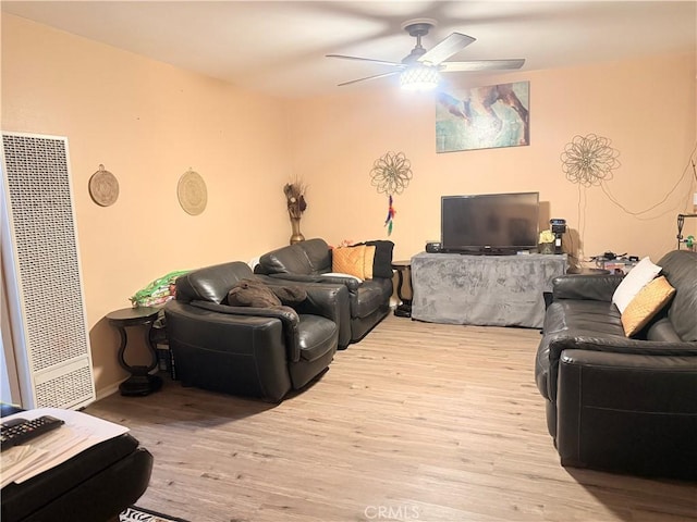 4700 Clair Del Ave Unit 620, Long Beach, CA 90807 - living room featuring a heating unit, a ceiling fan, and wood finished floors