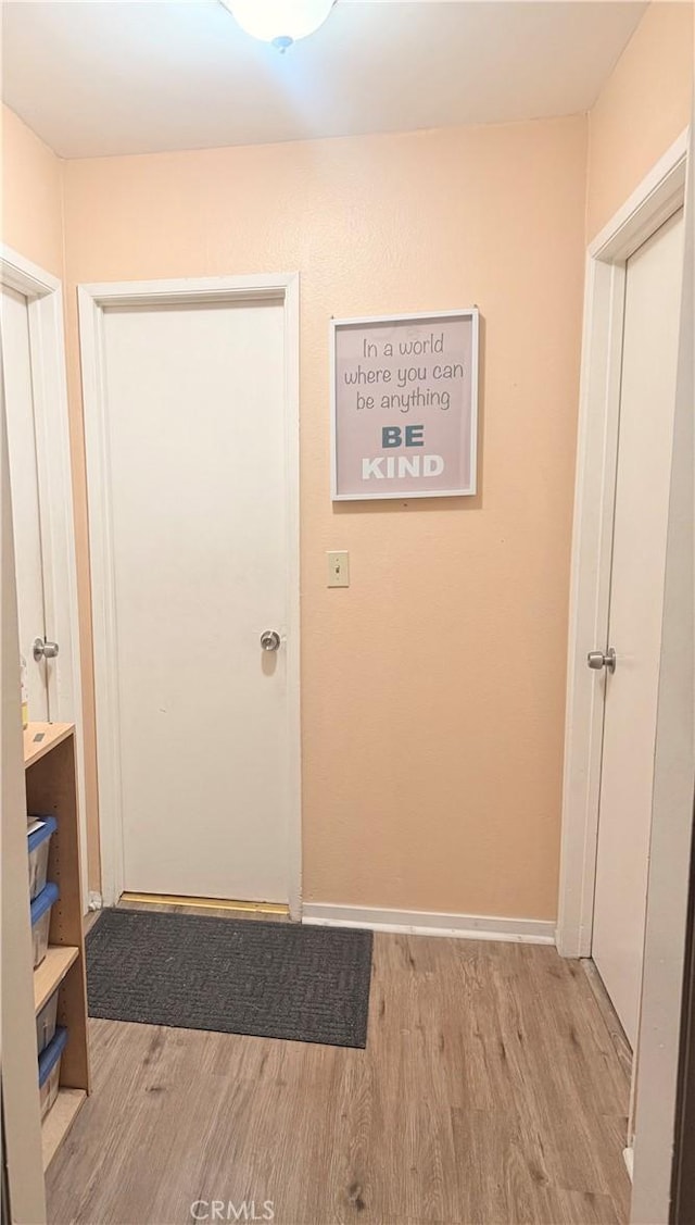 4700 Clair Del Ave Unit 620, Long Beach, CA 90807 - hallway with light wood-type flooring and baseboards
