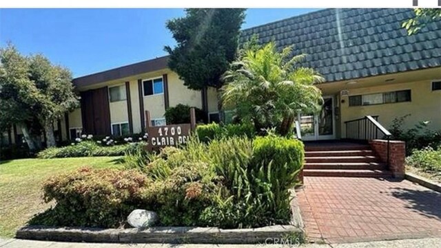 4700 Clair Del Ave Unit 620, Long Beach, CA 90807 - view of front facade with stucco siding