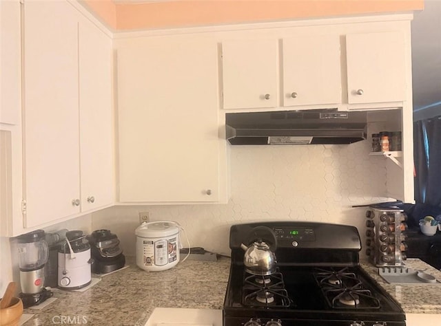 4700 Clair Del Ave Unit 620, Long Beach, CA 90807 - kitchen featuring gas range oven, under cabinet range hood, and white cabinets