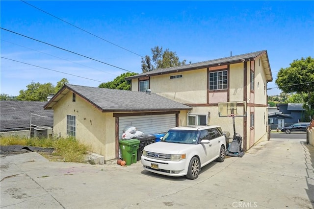 49604962 Gambier St, Los Angeles, CA 90032 - view of front facade with stucco siding and concrete driveway