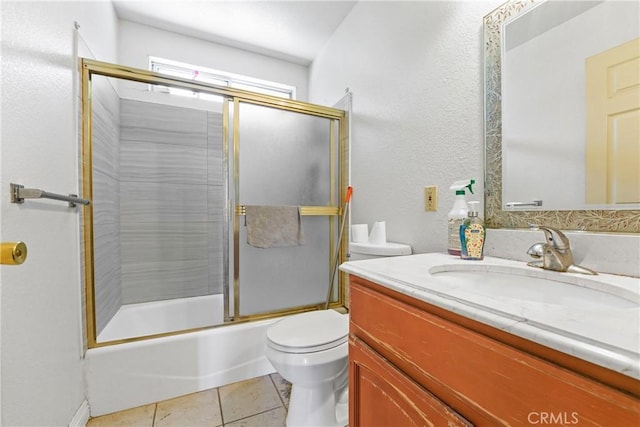 49604962 Gambier St, Los Angeles, CA 90032 - bathroom with toilet, vanity, tile patterned floors, and combined bath / shower with glass door