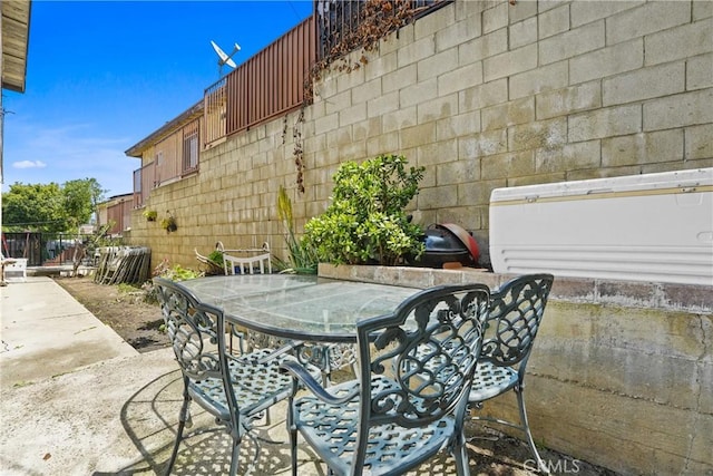 49604962 Gambier St, Los Angeles, CA 90032 - view of patio with outdoor dining space and fence