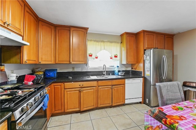 49604962 Gambier St, Los Angeles, CA 90032 - kitchen featuring appliances with stainless steel finishes, a sink, and brown cabinetry
