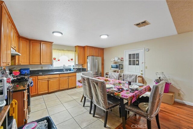 49604962 Gambier St, Los Angeles, CA 90032 - dining room featuring light tile patterned flooring