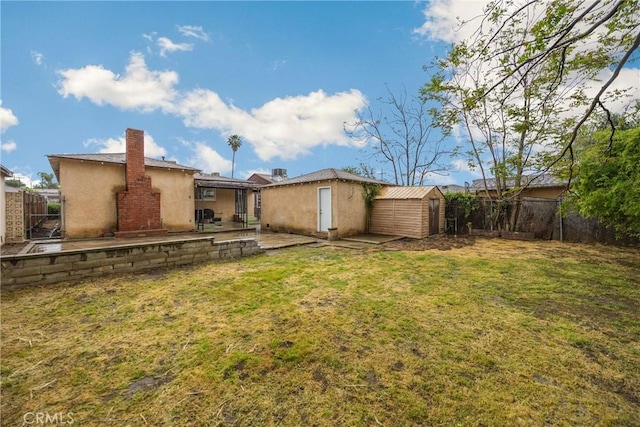 13023 Woodcock Ave, Sylmar, CA 91342 - view of yard featuring a patio and a gate