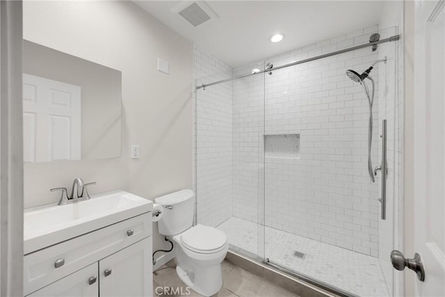 13023 Woodcock Ave, Sylmar, CA 91342 - bathroom featuring a stall shower, toilet, vanity, tile patterned flooring, and recessed lighting