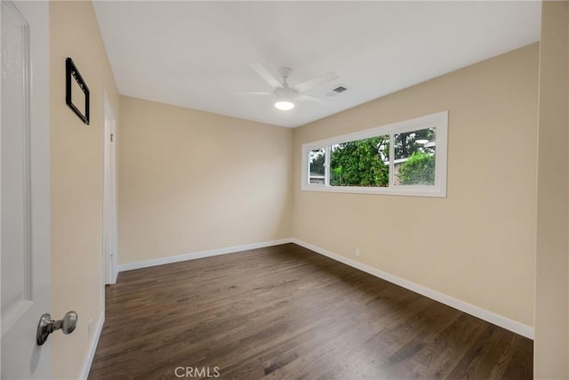 13023 Woodcock Ave, Sylmar, CA 91342 - spare room with a ceiling fan, baseboards, and dark wood-style flooring