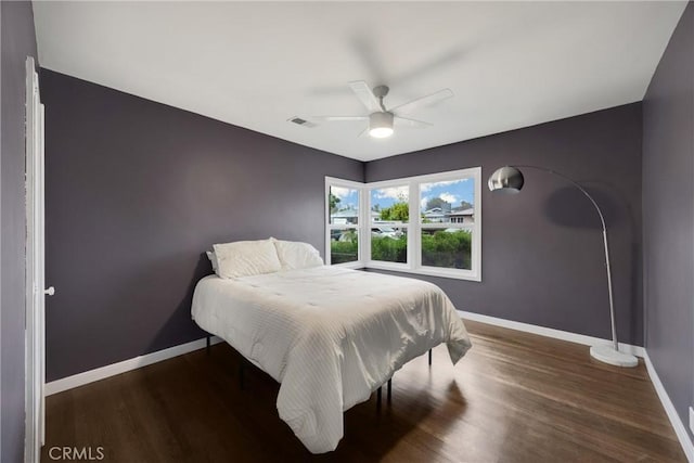 13023 Woodcock Ave, Sylmar, CA 91342 - bedroom with baseboards, wood finished floors, and a ceiling fan