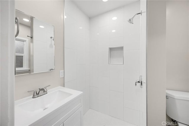 13023 Woodcock Ave, Sylmar, CA 91342 - full bathroom with toilet, a tile shower, recessed lighting, and vanity