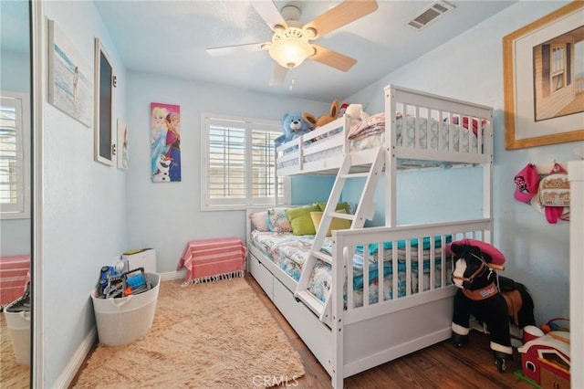 6253 Hamilton Ct, Chino, CA 91710 - bedroom with baseboards, wood finished floors, and a ceiling fan