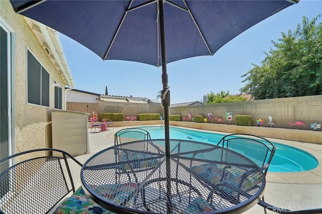 6253 Hamilton Ct, Chino, CA 91710 - view of pool with a fenced backyard, a patio, and outdoor dining space