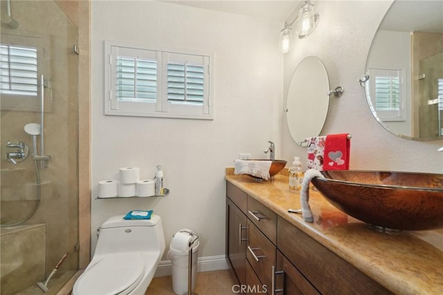 6253 Hamilton Ct, Chino, CA 91710 - full bathroom with vanity, a shower with door, and toilet