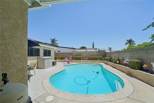6253 Hamilton Ct, Chino, CA 91710 - view of swimming pool with a fenced backyard and a patio area