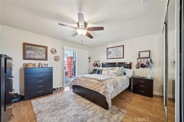 6253 Hamilton Ct, Chino, CA 91710 - bedroom featuring light wood-type flooring, a ceiling fan, access to outside, and baseboards