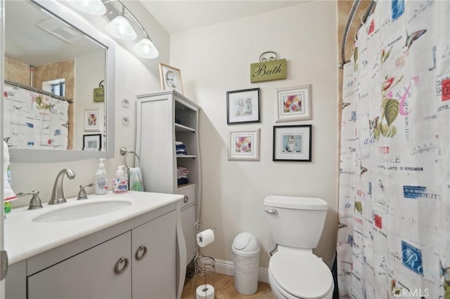 6253 Hamilton Ct, Chino, CA 91710 - bathroom featuring vanity, toilet, a shower with shower curtain, and tile patterned flooring