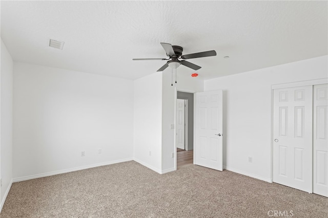 16925 Nanticoke Rd, Apple Valley, CA 92307 - unfurnished bedroom with baseboards, carpet flooring, a closet, and visible vents