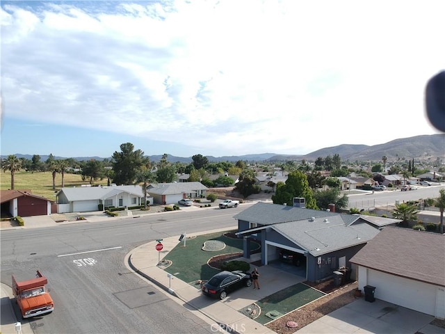 26376 Mahaffey, Menifee, CA 92586 - aerial perspective of suburban area with a mountainous background