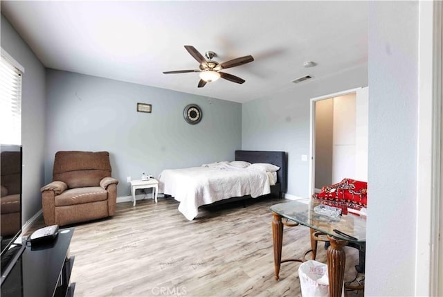26376 Mahaffey, Menifee, CA 92586 - bedroom featuring light wood-type flooring, a ceiling fan, and baseboards