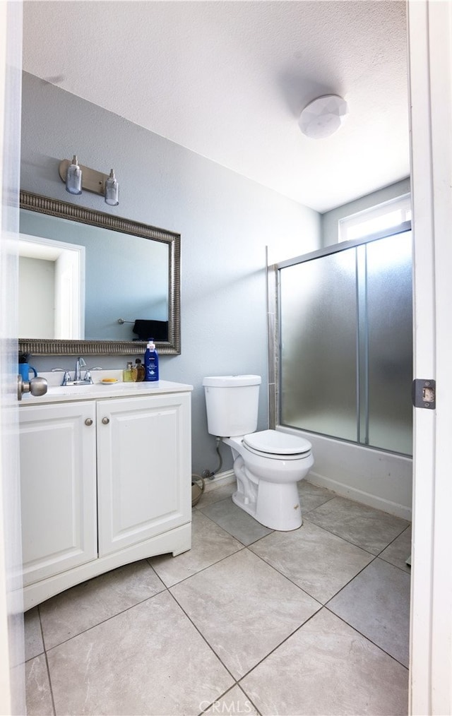 26376 Mahaffey, Menifee, CA 92586 - bathroom featuring vanity, shower / bath combination with glass door, and tile patterned flooring