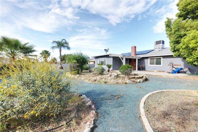 26376 Mahaffey, Menifee, CA 92586 - single story home featuring solar panels, a chimney, and central AC