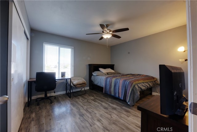 26376 Mahaffey, Menifee, CA 92586 - bedroom with wood finished floors, baseboards, a ceiling fan, and an office area