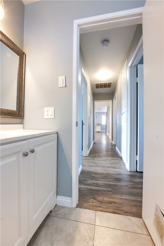 26376 Mahaffey, Menifee, CA 92586 - corridor featuring light tile patterned floors and baseboards