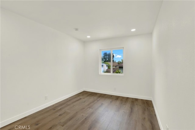 21011 N Hampton Way, Lake Forest, CA 92630 - spare room featuring wood finished floors, baseboards, and recessed lighting
