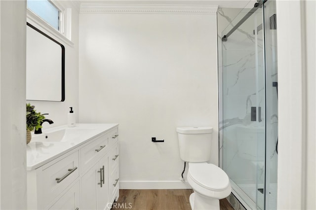 21011 N Hampton Way, Lake Forest, CA 92630 - bathroom featuring baseboards, a marble finish shower, toilet, vanity, and wood finished floors