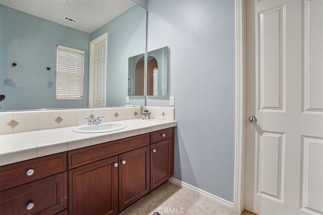 200 Cross Rail Ln, Norco, CA 92860 - bathroom with vanity, tile patterned floors, and baseboards