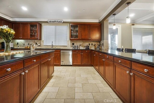 200 Cross Rail Ln, Norco, CA 92860 - kitchen with stainless steel dishwasher, stone tile floors, healthy amount of natural light, crown molding, and a sink