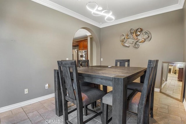 200 Cross Rail Ln, Norco, CA 92860 - dining room with stone tile flooring, arched walkways, crown molding, baseboards, and a chandelier