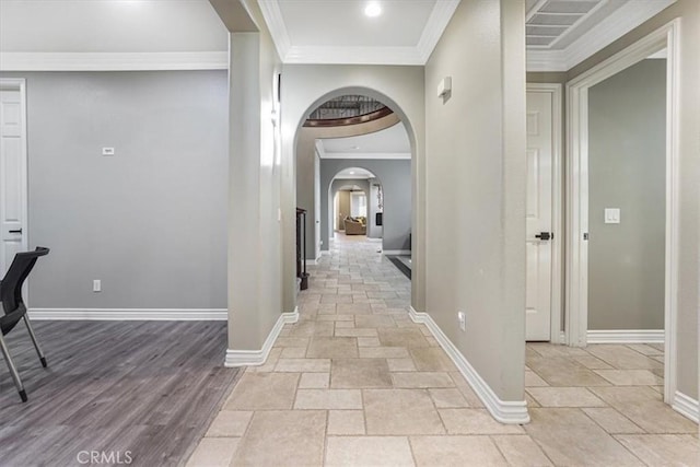 200 Cross Rail Ln, Norco, CA 92860 - hallway with arched walkways, stone tile floors, baseboards, and crown molding