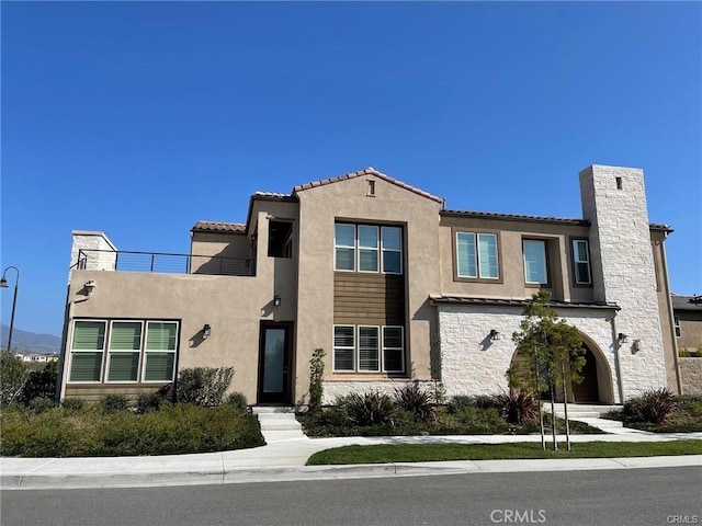 view of front of house with stucco siding