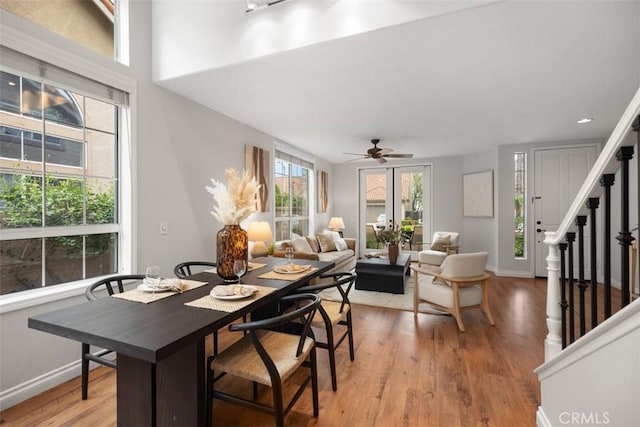15 Saltillo, Rancho Santa Margarita, CA 92688 - dining area with light wood-type flooring, a ceiling fan, stairway, and baseboards
