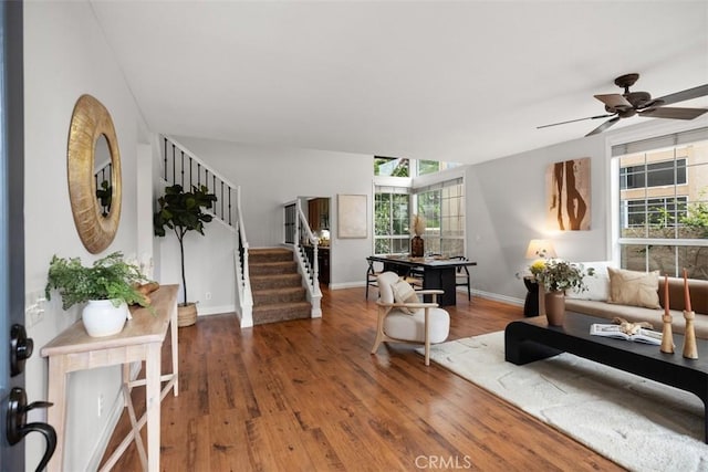 15 Saltillo, Rancho Santa Margarita, CA 92688 - living area with stairway, wood finished floors, a ceiling fan, and baseboards