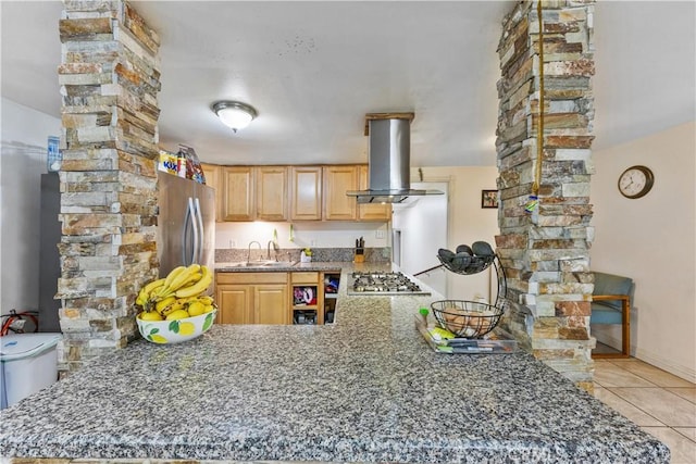 40481 Sage Rd, Hemet, CA 92544 - kitchen with stainless steel appliances, ornate columns, island range hood, light tile patterned floors, and light brown cabinets