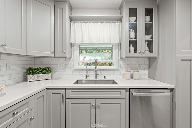 204 E Floral Ave, Arcadia, CA 91006 - kitchen with stainless steel dishwasher, a sink, tasteful backsplash, and glass insert cabinets
