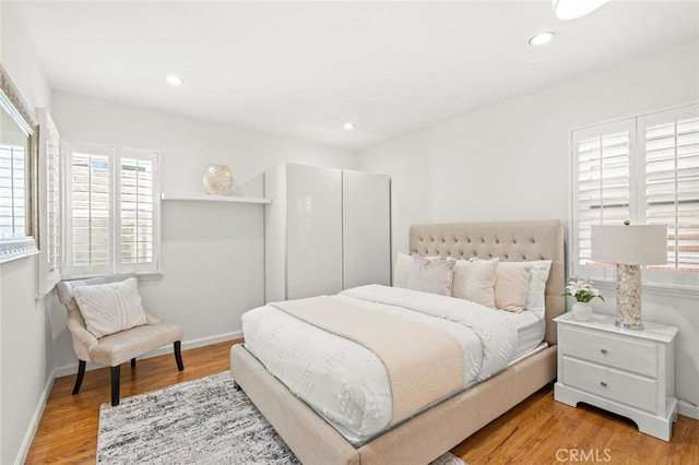 204 E Floral Ave, Arcadia, CA 91006 - bedroom featuring wood finished floors, baseboards, and recessed lighting