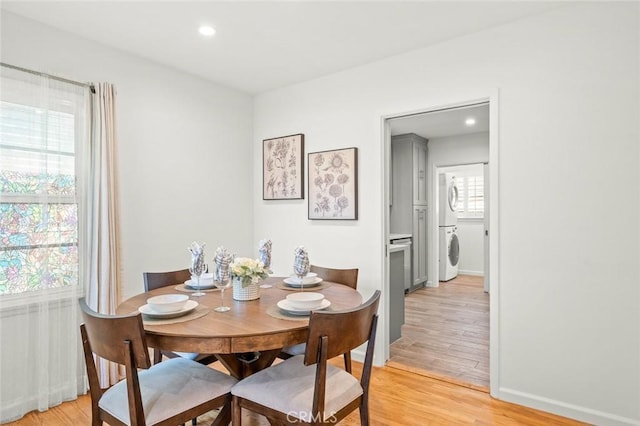 204 E Floral Ave, Arcadia, CA 91006 - dining area featuring stacked washing machine and dryer, light wood-type flooring, baseboards, and recessed lighting