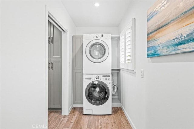 204 E Floral Ave, Arcadia, CA 91006 - laundry area with estacked washer and dryer, baseboards, light wood finished floors, and recessed lighting