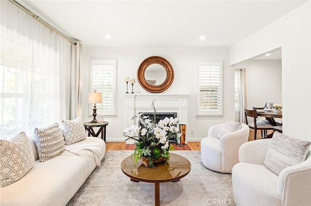 204 E Floral Ave, Arcadia, CA 91006 - living area with wood finished floors, a fireplace with flush hearth, crown molding, recessed lighting, and baseboards
