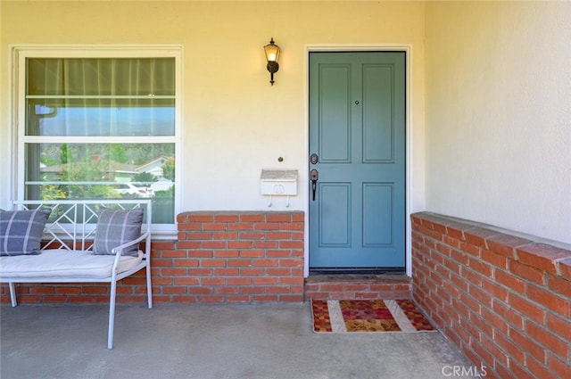 204 E Floral Ave, Arcadia, CA 91006 - entrance to property with stucco siding, a porch, and brick siding