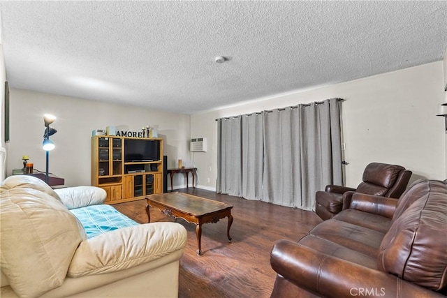 1572 Fremont Ave, Simi Valley, CA 93065 - living room with a textured ceiling, wood finished floors, and a wall unit AC