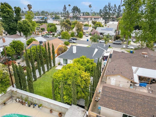birds eye view of property with a residential view