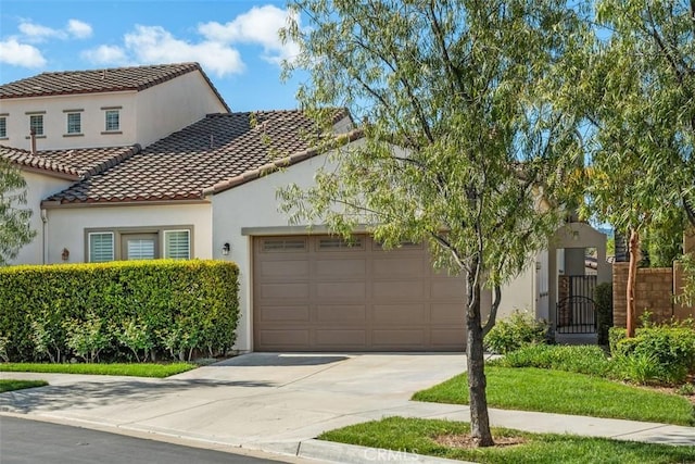 23741 Spruce Meadow Ct, Valencia, CA 91354 - mediterranean / spanish house with fence, concrete driveway, a garage, stucco siding, and a tiled roof