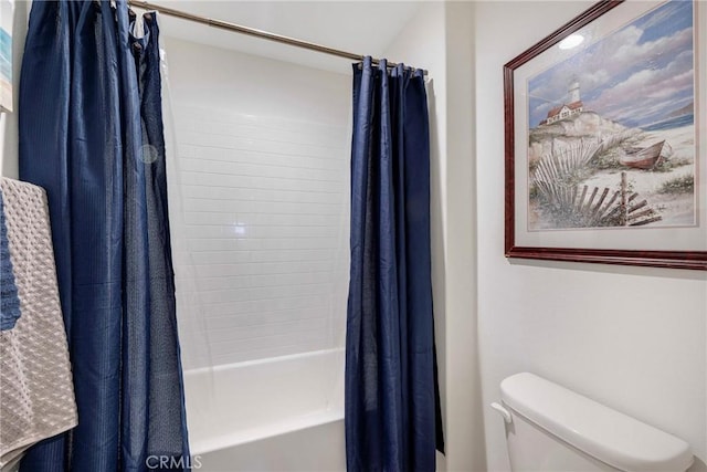 full bath featuring toilet and shower / tub combo