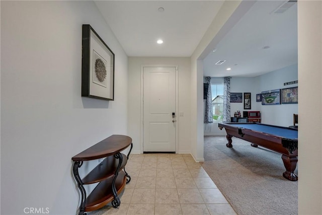 foyer entrance featuring light tile patterned floors, billiards table, light carpet, recessed lighting, and baseboards